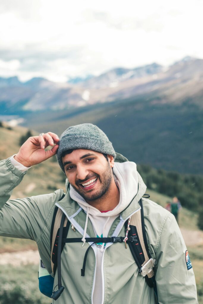 smiling man hiking