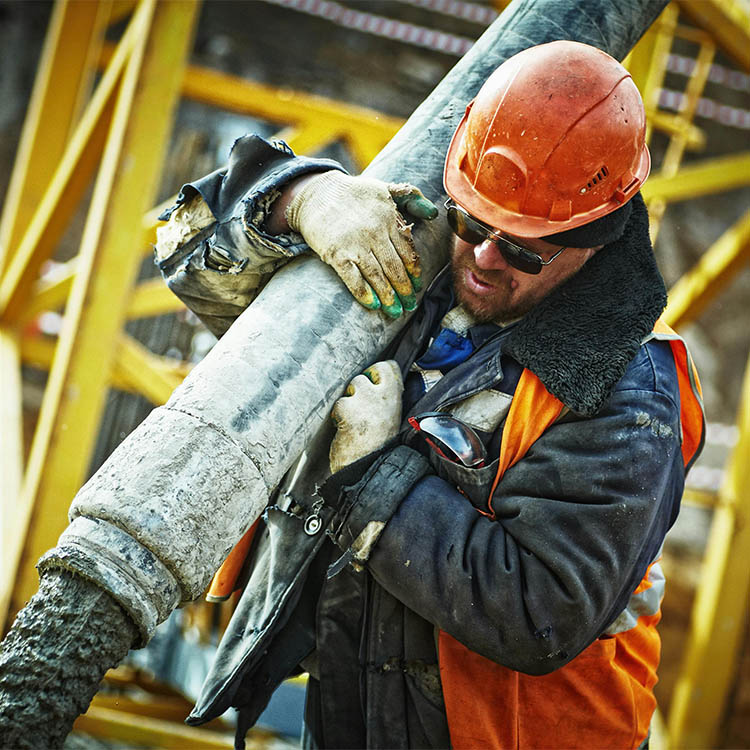 square image of man holding cement pouring pipe